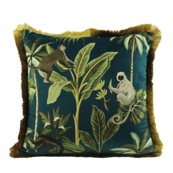Coussin au décor jungle avec palmiers et singes sur fond vert canard.