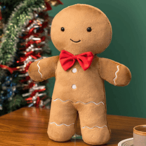 Coussin de décoration, en forme du célèbre Gingerman, le biscuit au gingembre de Noël anglais.