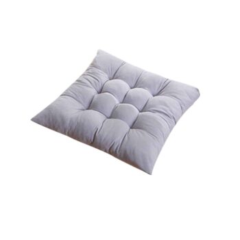 Coussin carré gris imperméable pour l'extérieur.