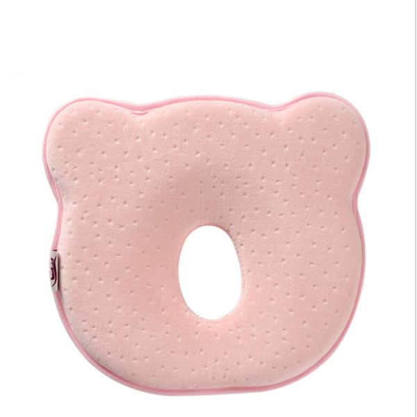 Joli coussin anti-tête plate rose en forme d'ourson pour bébé fille.