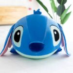 Coussin en peluche kawaii Stitch de forme cylindrique vu de face