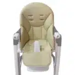 Coussin de chaise en cuir (Peg Perego Prima Pappa Zero3) de couleur beige posé sur une chaise haute blanche